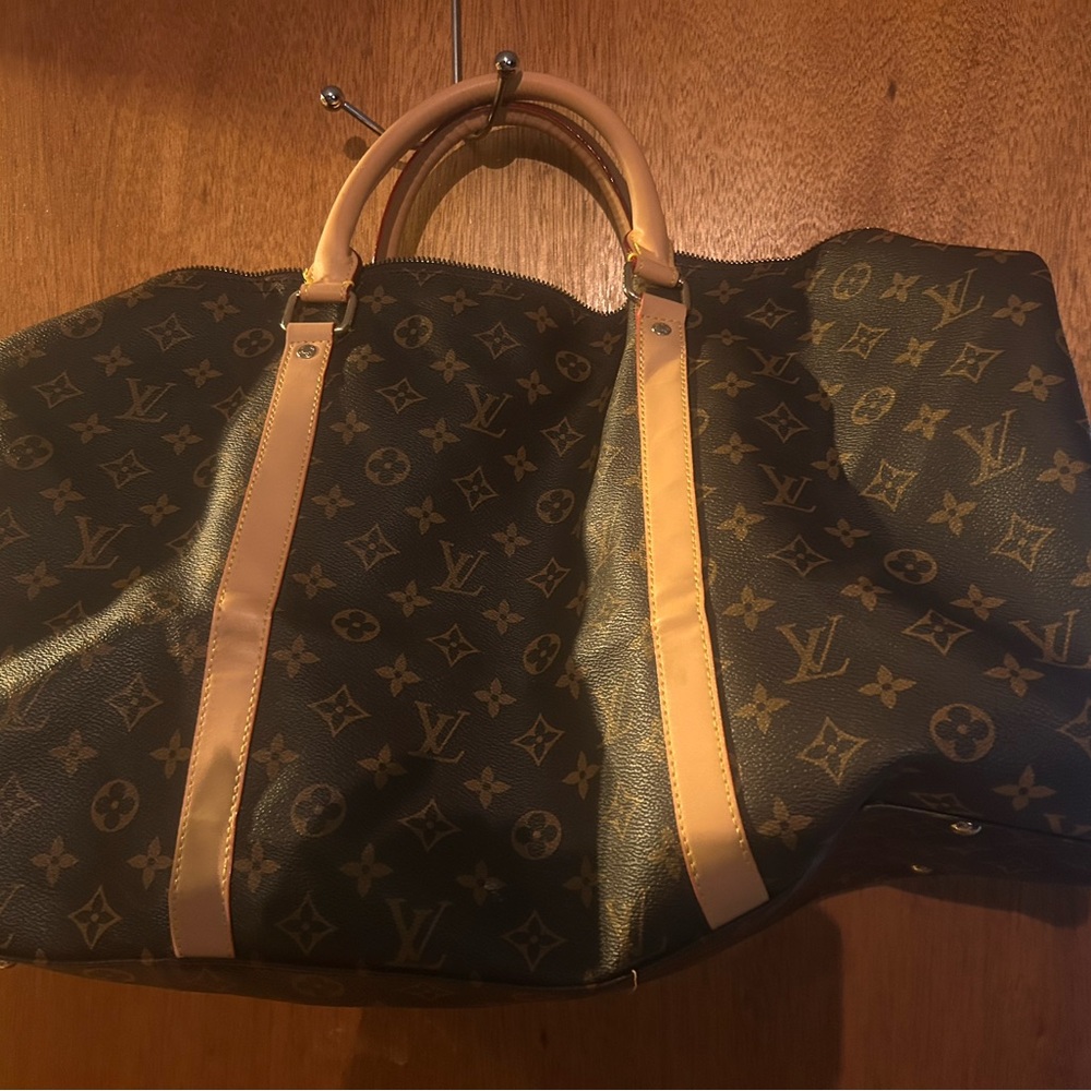 Elegant Brown Monogram Duffel Bag